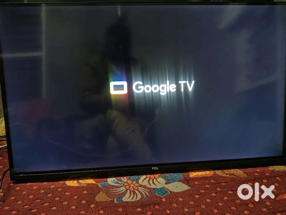 32,, TCL Google tv one year old with bill