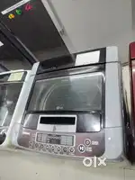 LG washing machine fully automatic top load with warranty and good con