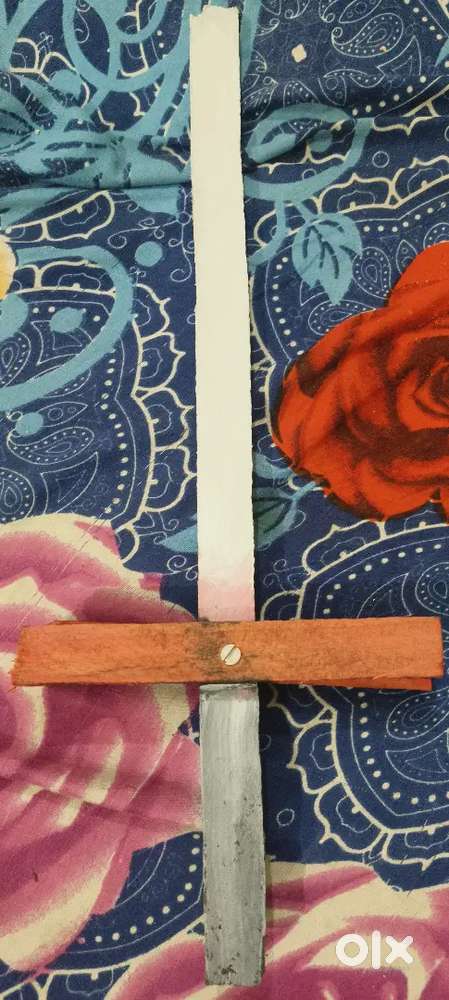 Wooden sword. Good for child between 8 to 12.