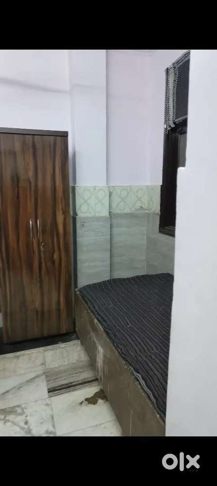 Room with shared kitchen and bathroom