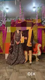 Women and men’s party wear gown-sherwani combo
