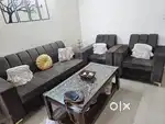 5 seater sofa with center glass table
