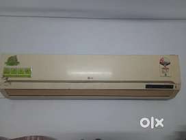 LG 2 star 2011 model split A/C with outdoor unit and remote control