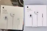 Apple wired earphones (earbuds).
