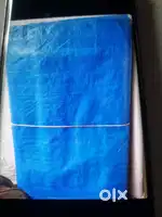 Almost new vacuum cleaner and tarpaulin