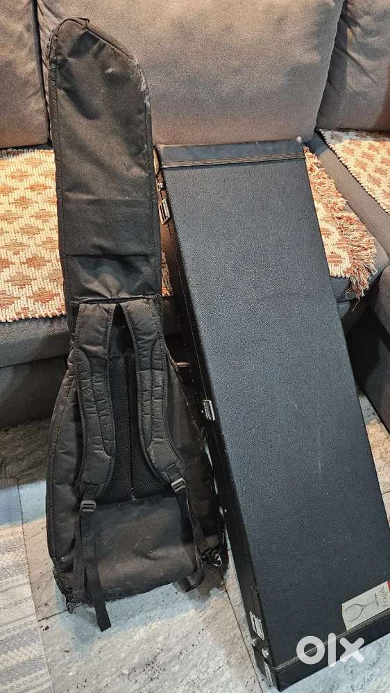 Bass guitar hard case and Fender gig bag combo