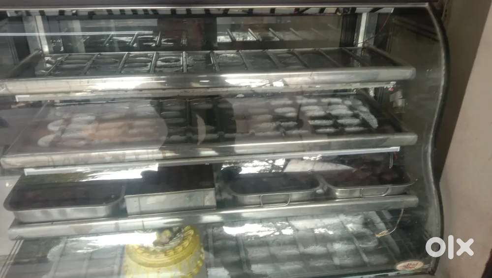 cake and sweet counter on condition  rate 45000 4 feet Abid freezer