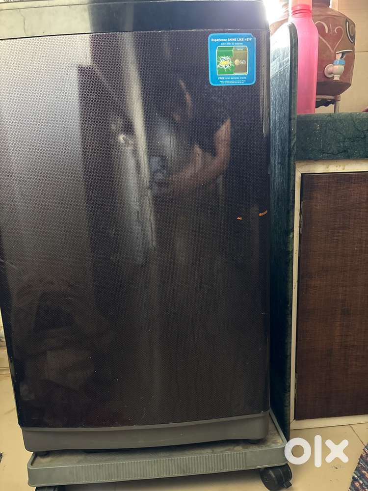 Title: 7-Year-Old Fully Functional Washing Machine for Sale