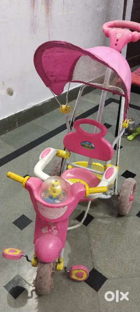 Childran bicycle and horse