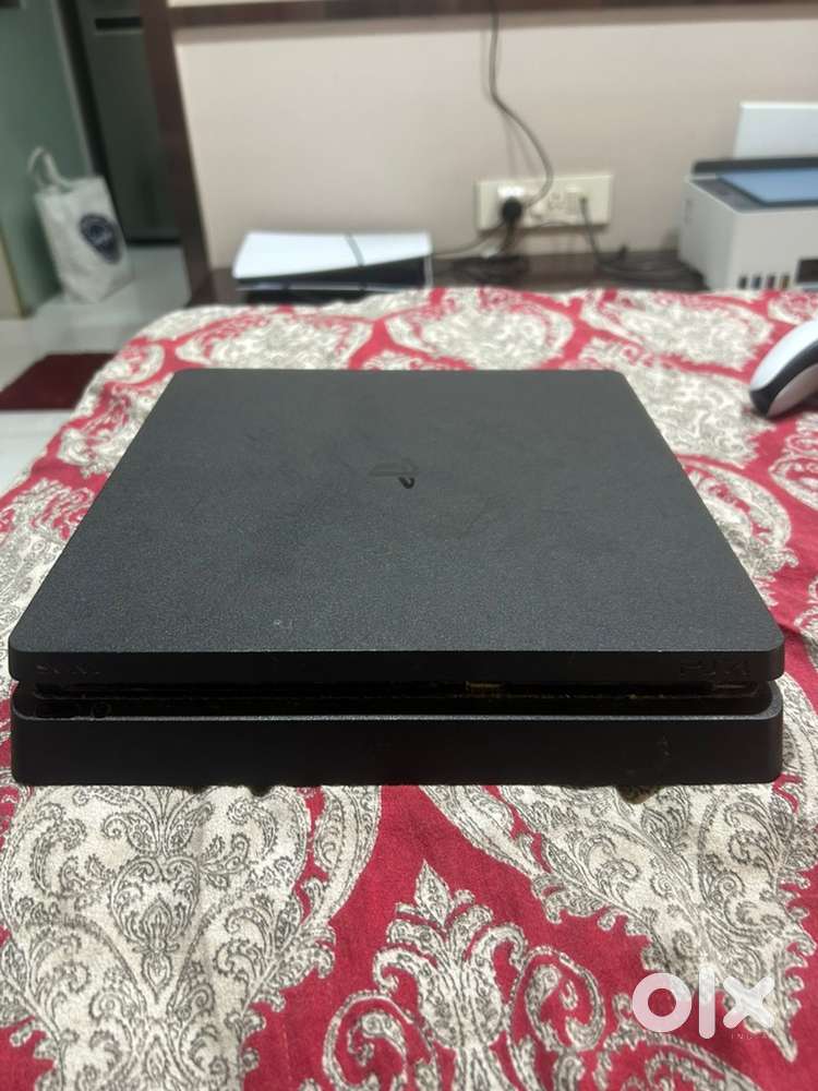 Ps4 slim 1TB with race steering wheel