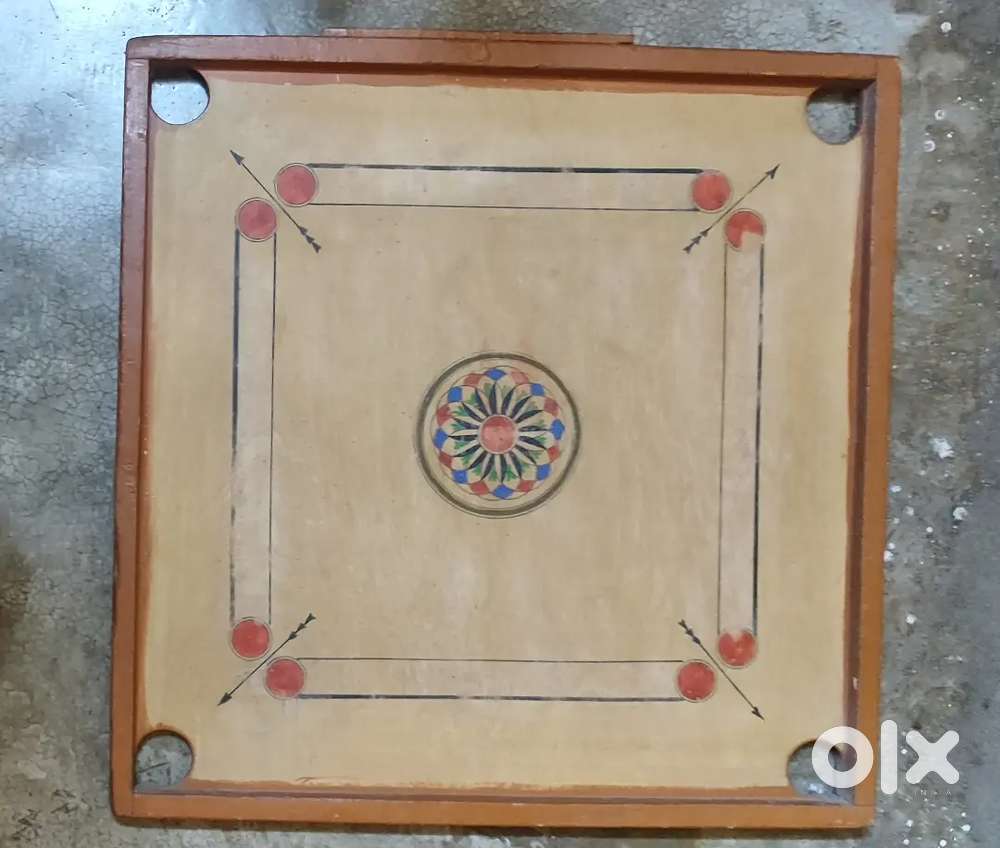 WOODEN CAROOM BOARD IN GOOD CONDITION WITH SRTIKER AND GOTI