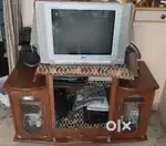 Selling LG TV with Tv trolley in Good condition