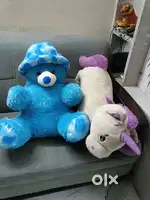 Toy teddy bear and unicorn