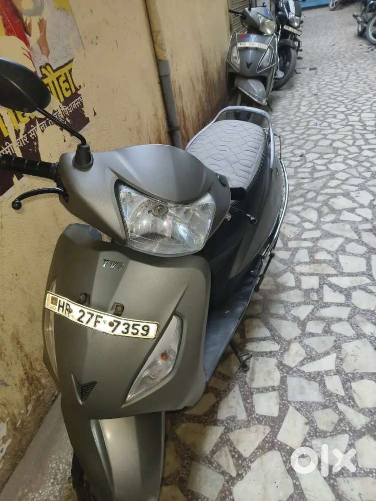 Jupiter scooter 110 cc grey in colour
