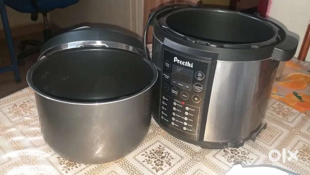 Multi purpose electric rice cooker