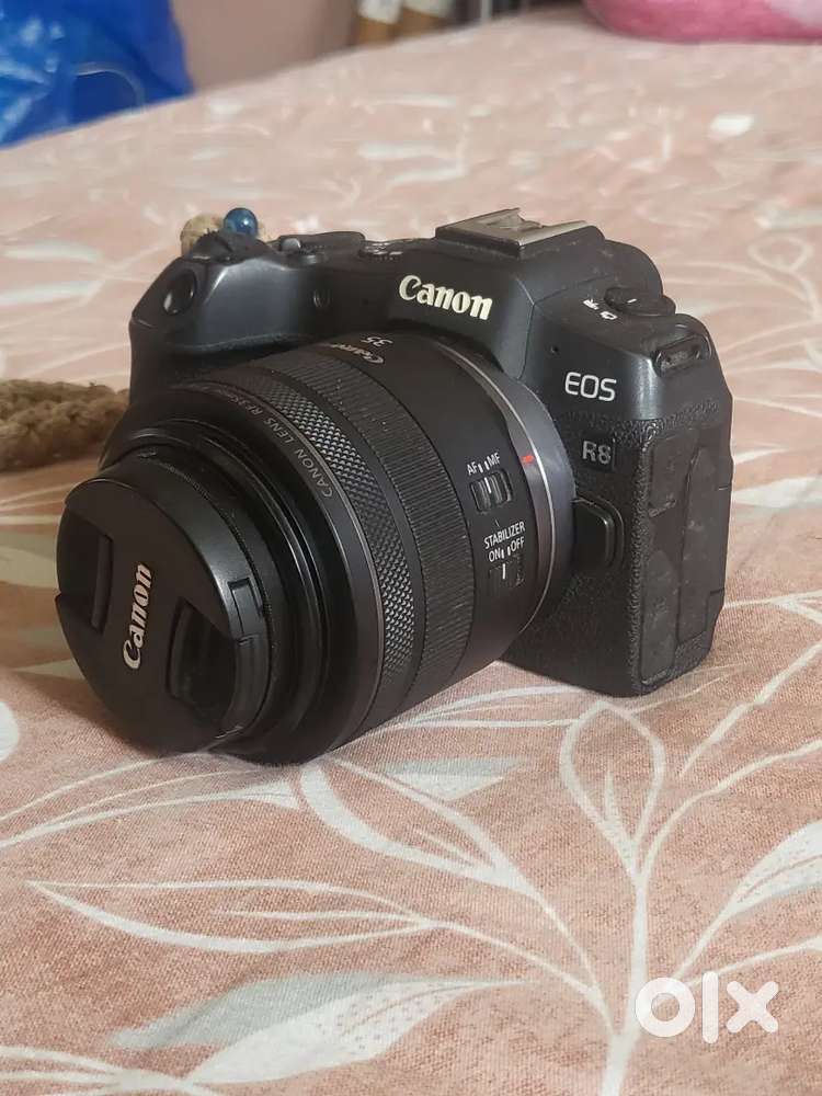 Cannon R8 camera with 35 mm f1.8 lens . With bill box and WARRANTY.  .