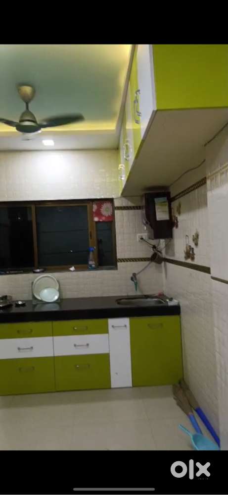 1 bhk flat for sale good condition hall and kitchen wall tiles.