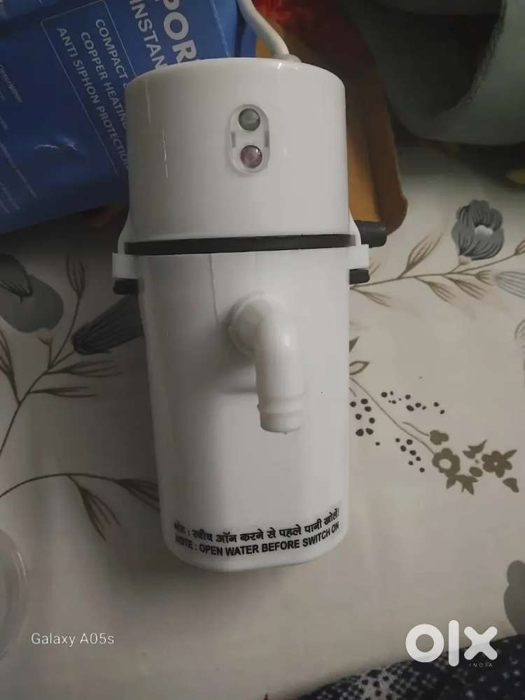 Portable instant Geyser