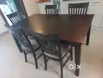 Damro wooden dining table with 6 chairs available