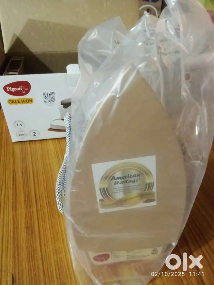 Pegeon iron box with 2 year warranty