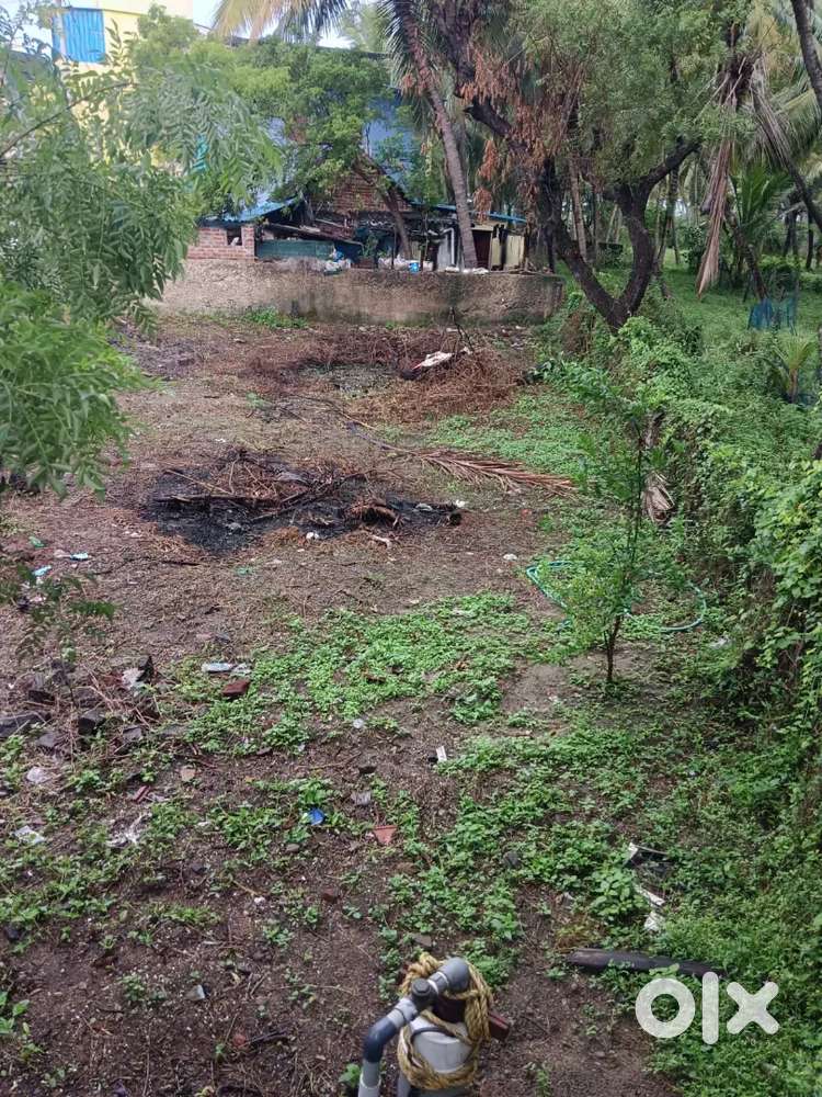 Road facing shop with adjoining vacant land