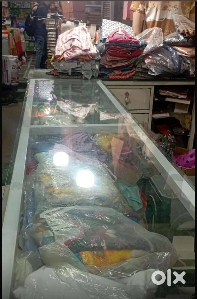 Running Shop for rent with clothes stock
