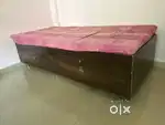 Single wooden bed with storage