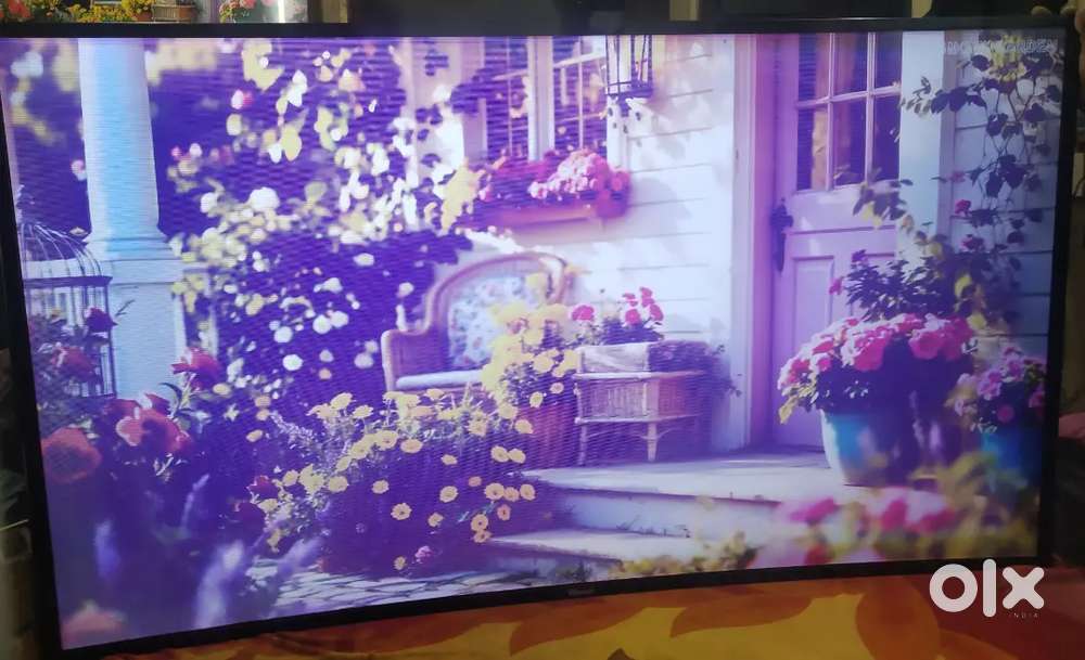 Mitsun 65 Curved Tv working condition with display issues for sale