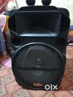 Good quality speaker with remote and mike with trolley bag like