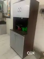 Microwave table with storage cupboard
