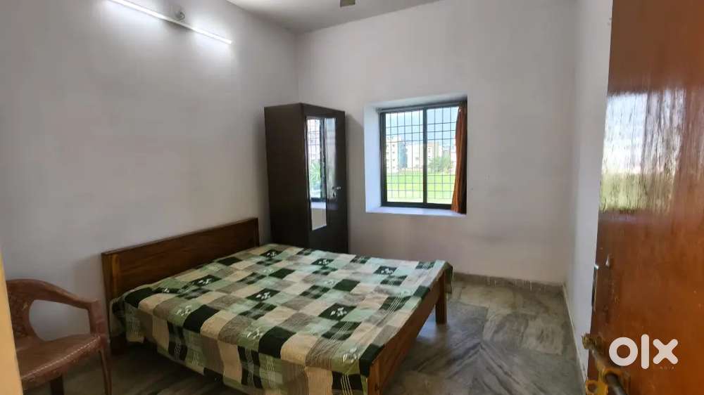1 furnished Room inside a 4 BHK flat with separate bathroom, kitchen.
