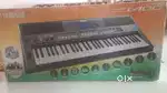 Brand new Yamaha PSR I400 Piano