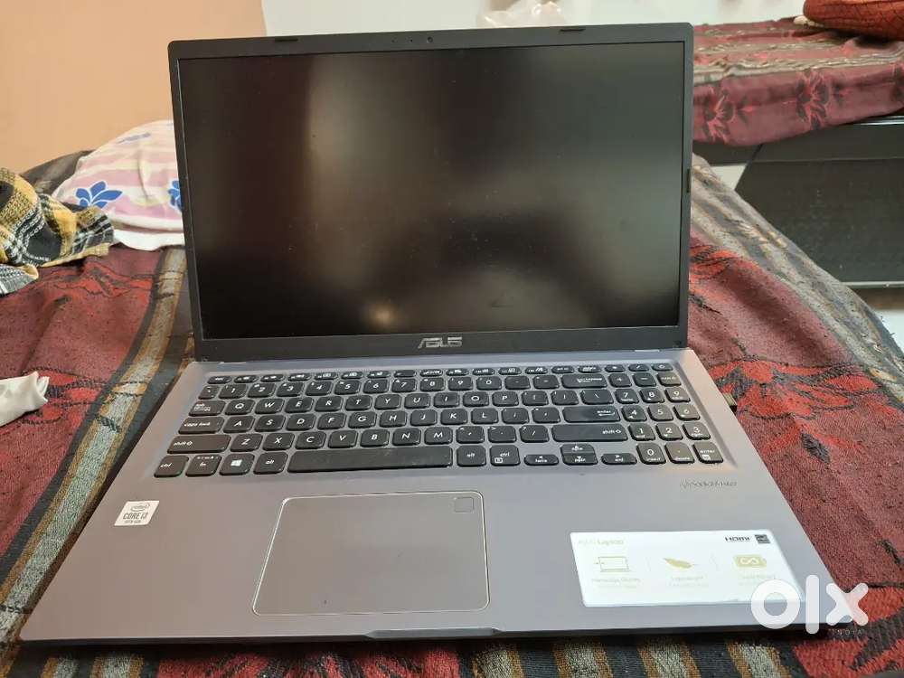 Laptop for sell with wireless mouse
