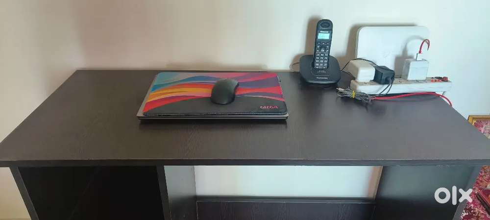 Computer table with revolving chair