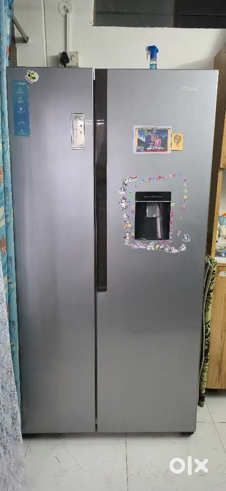 Marq 560L frost free side by side refrigerator with water dispenser