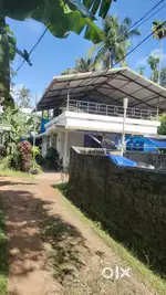8.25 cent land 2 bhk semi-furnished house for sale. Pariyaram