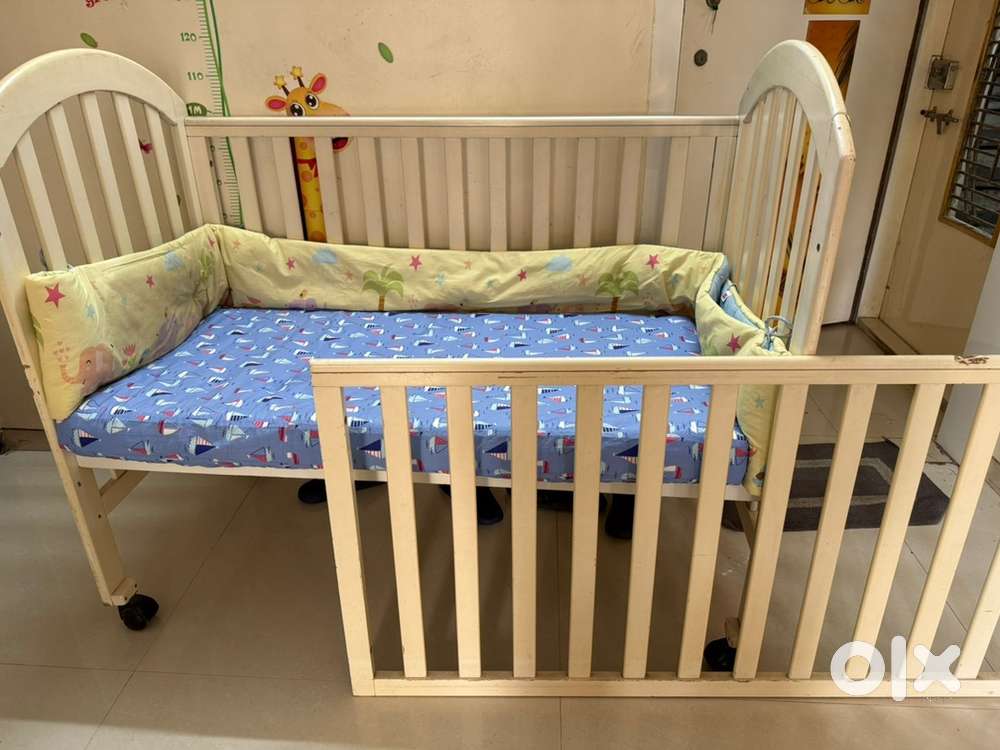 Baby Cot with bed and bedsheet