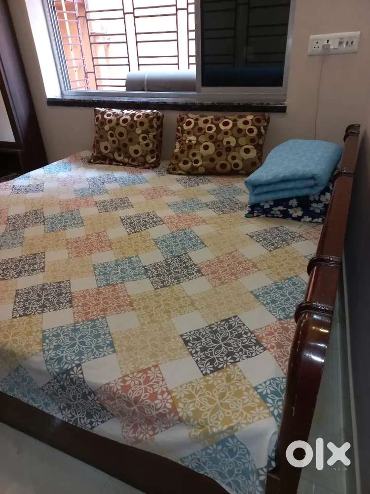 One double bed and one office table