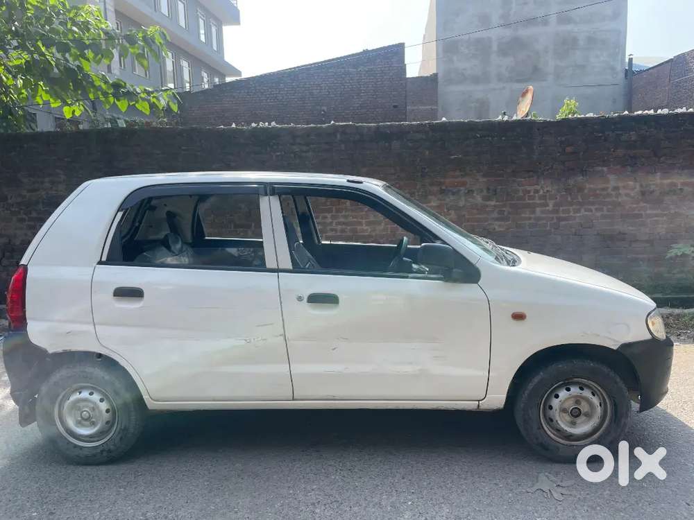 Alto white colour lxi never accidental