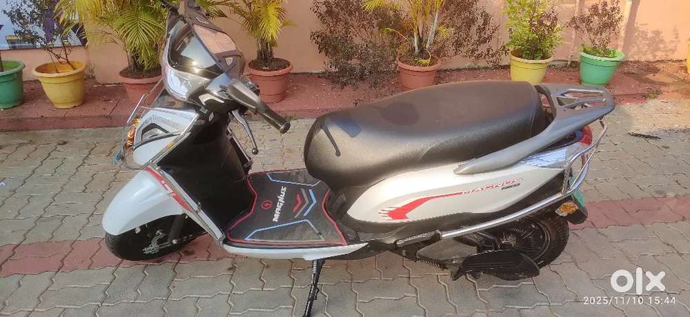 One month old Ampere Magnus Neo EV scooter in New excellent condition.