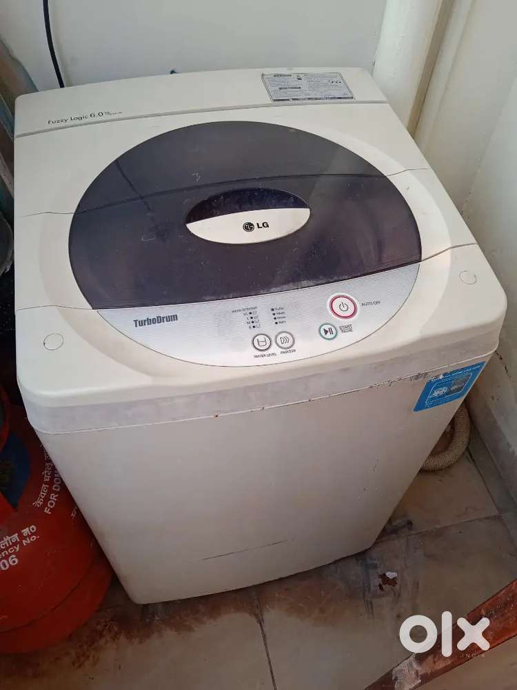 LG 6kg washing machine top load, running
