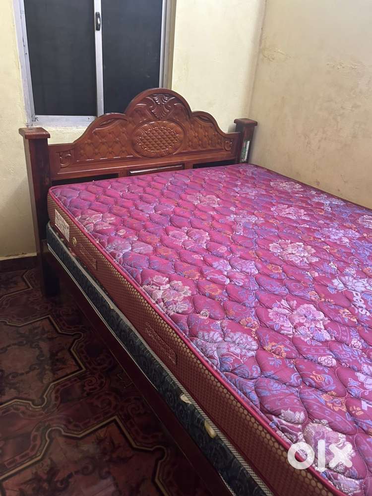Queen size bed with spring mattress