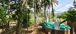 A property of 1 acres of land including a house