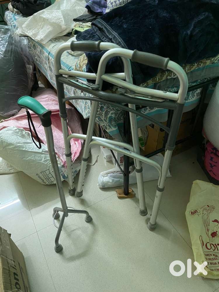 Walker and walking stick both are new condition for sale.