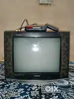 Samsung tv ultra slim in ok condition and airtel dvd and remote