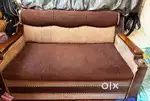 5years old, pure segun wood sofa come bed...