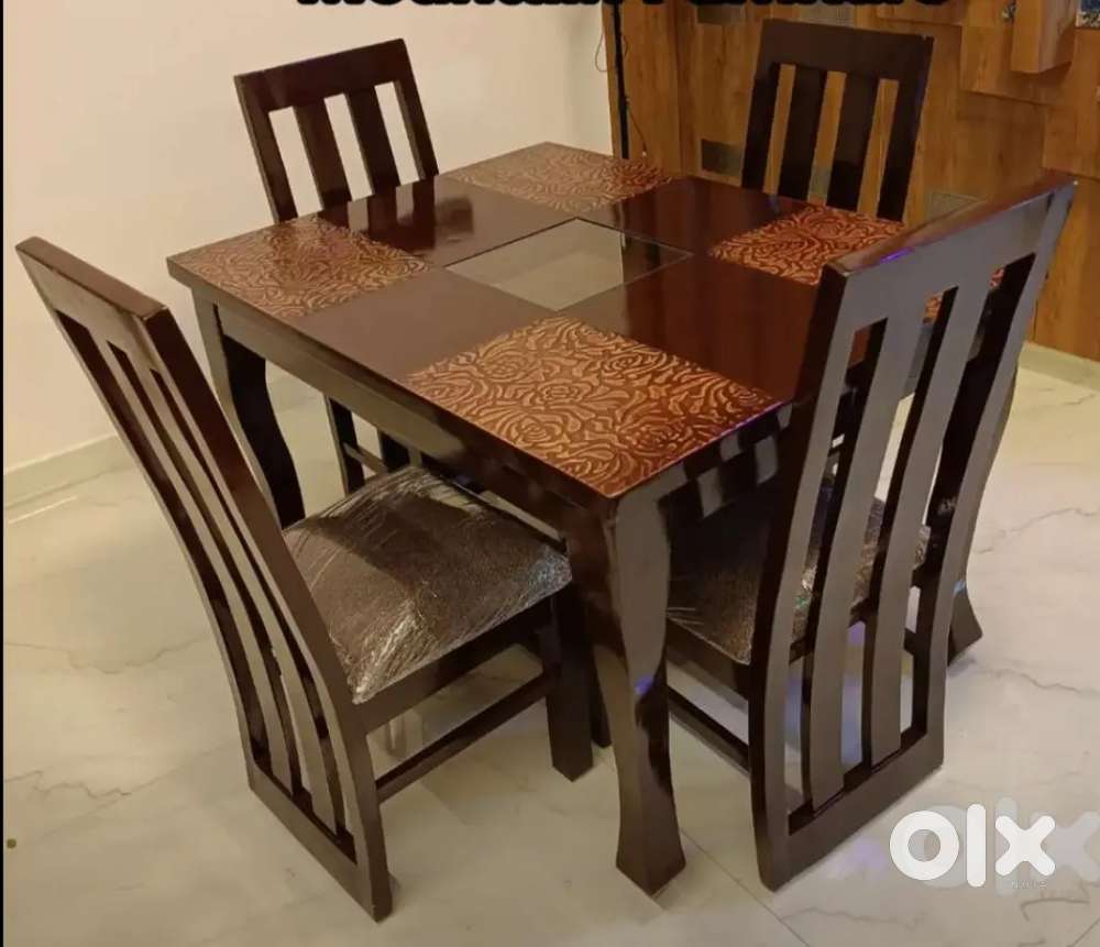 Brand New Aasham teak wood four seater dining table available