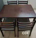Dining table along with four chairs
