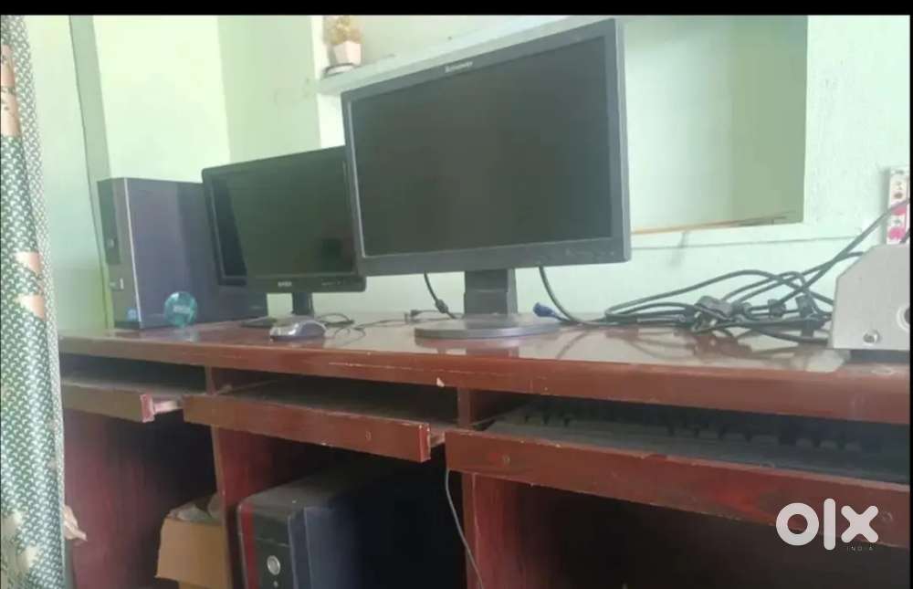 Two computer setups with table
