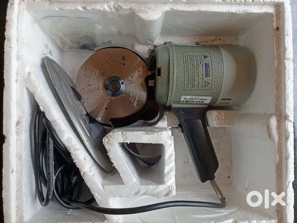 TAKING Round knife cloth cutting machine brand new but not used yet..